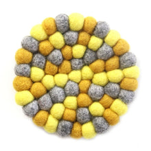 Load image into Gallery viewer, Hand Crafted Felt Ball Trivets from Nepal: Round Chakra, Yellows - Global Groove (T)