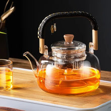 Load image into Gallery viewer, GIANXI Glass Tea Pot With Weave Handle Chinese Heat-resistant Glass
