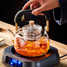 Load image into Gallery viewer, GIANXI Glass Tea Pot With Weave Handle Chinese Heat-resistant Glass
